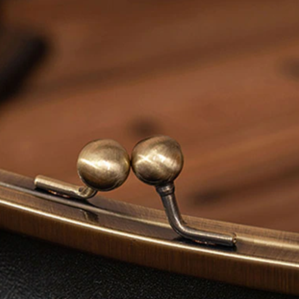 Kiss-Lock-Beutel – Graces unverzichtbares Retro-Chic-Accessoire